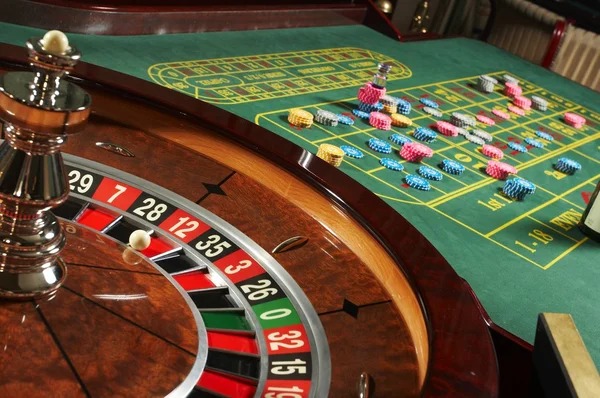 Live blackjack dealer at multi-camera studio table